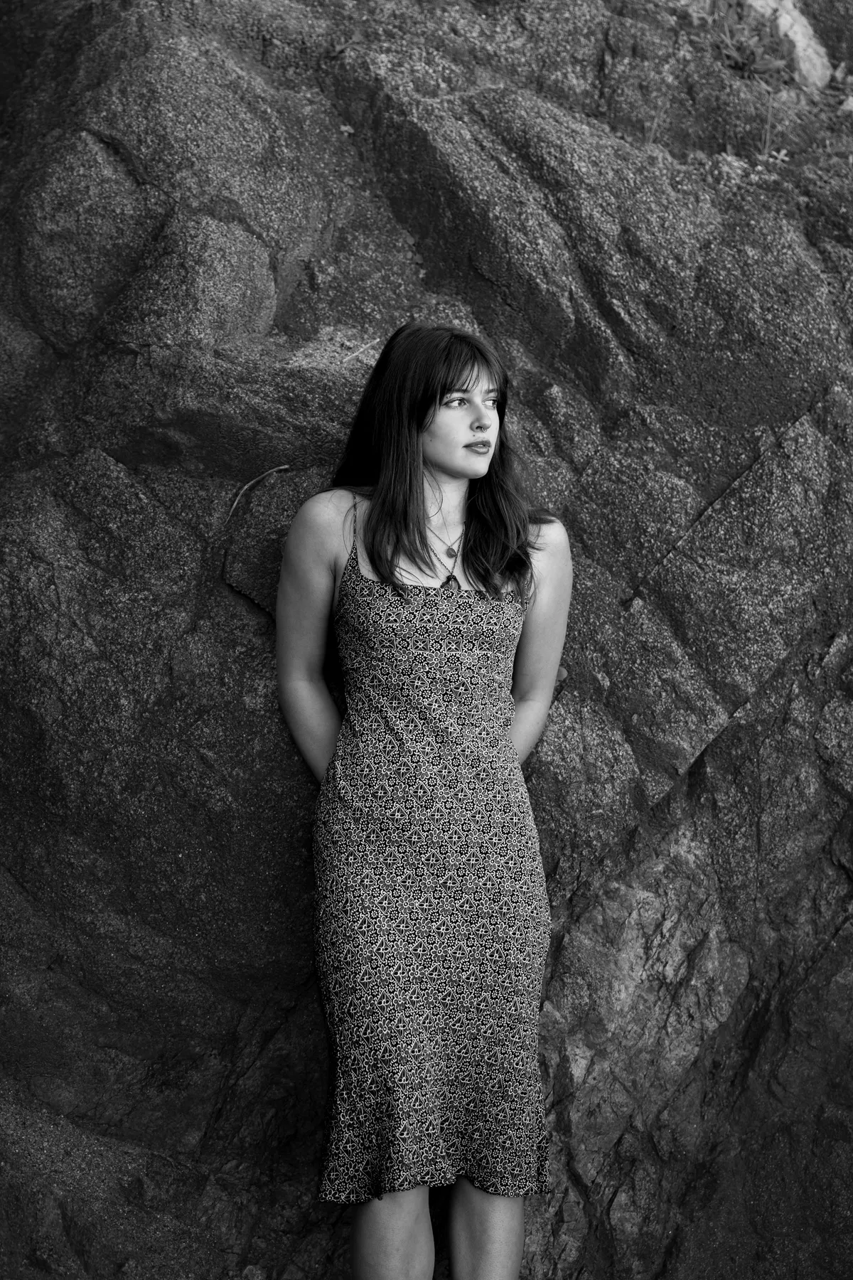 Portrait against textured rocks
